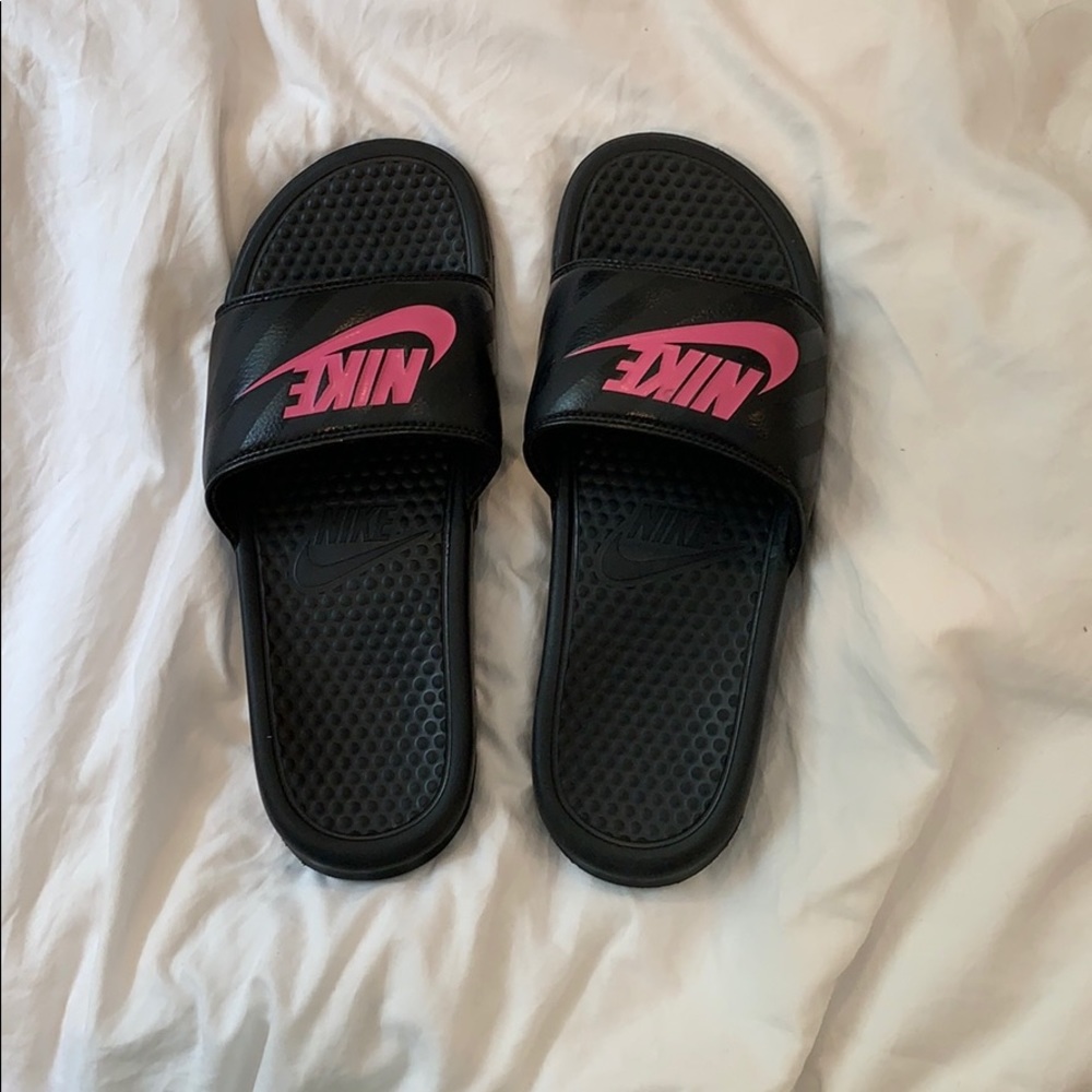 Nike slides.